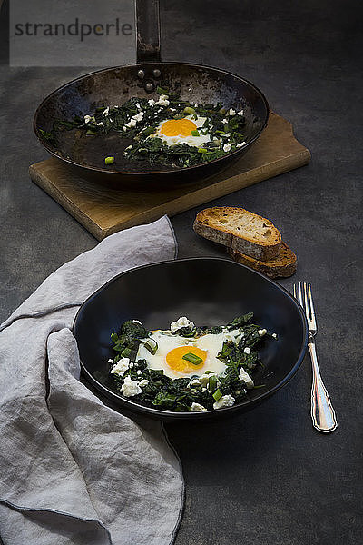 Green Shakshouka with baby spinat,  chard,  spring onions and basil