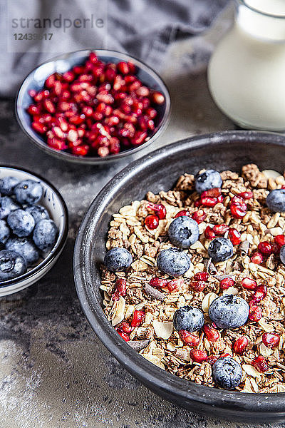 Bowl of muesli with blueberries and pomegranate seed