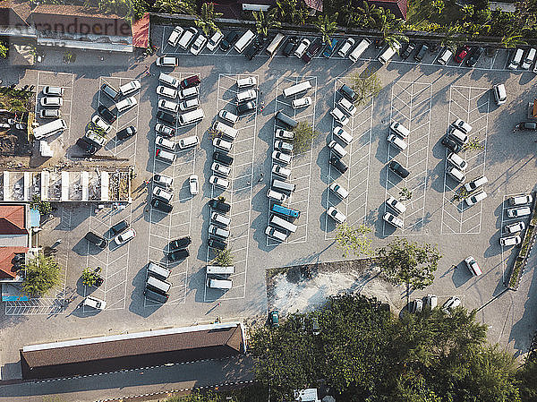 Indonesia,  Bali,  Aerial view of Car parking near Tanah Lot-temple