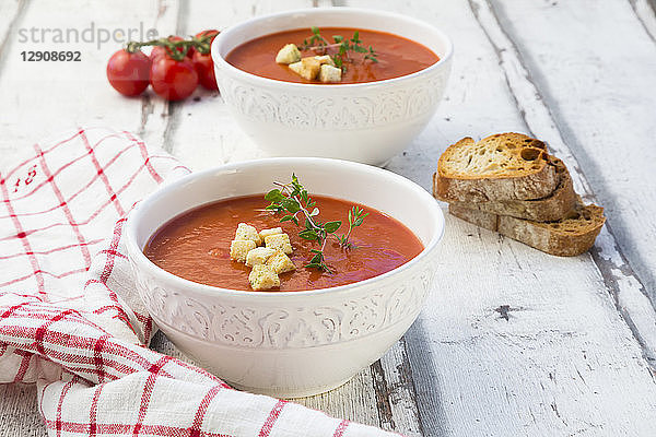 Mediterran tomato soup with roasted bread,  croutons and thyme