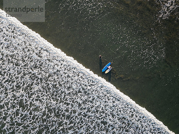 Indonesia,  Bali,  Kuta beach,  Aerial view of surfers