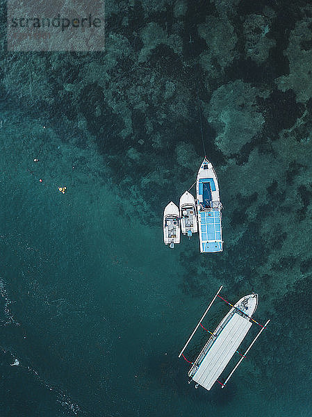 Indonesia,  Bali,  Aerial view of motorboats from above