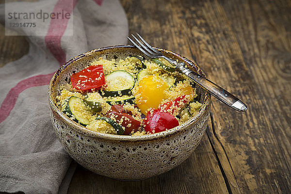 Bowl of oven vegetables with couscous