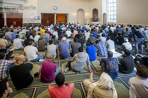 Muslim Men Gather for Prayers in Mosque