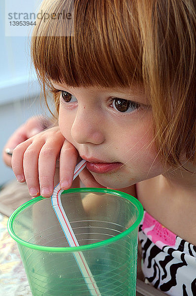 Toddler Drinking from a Straw