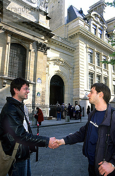 Handshake Between Two French Students
