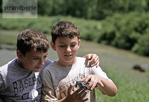 8 year-old Boys with Turtle